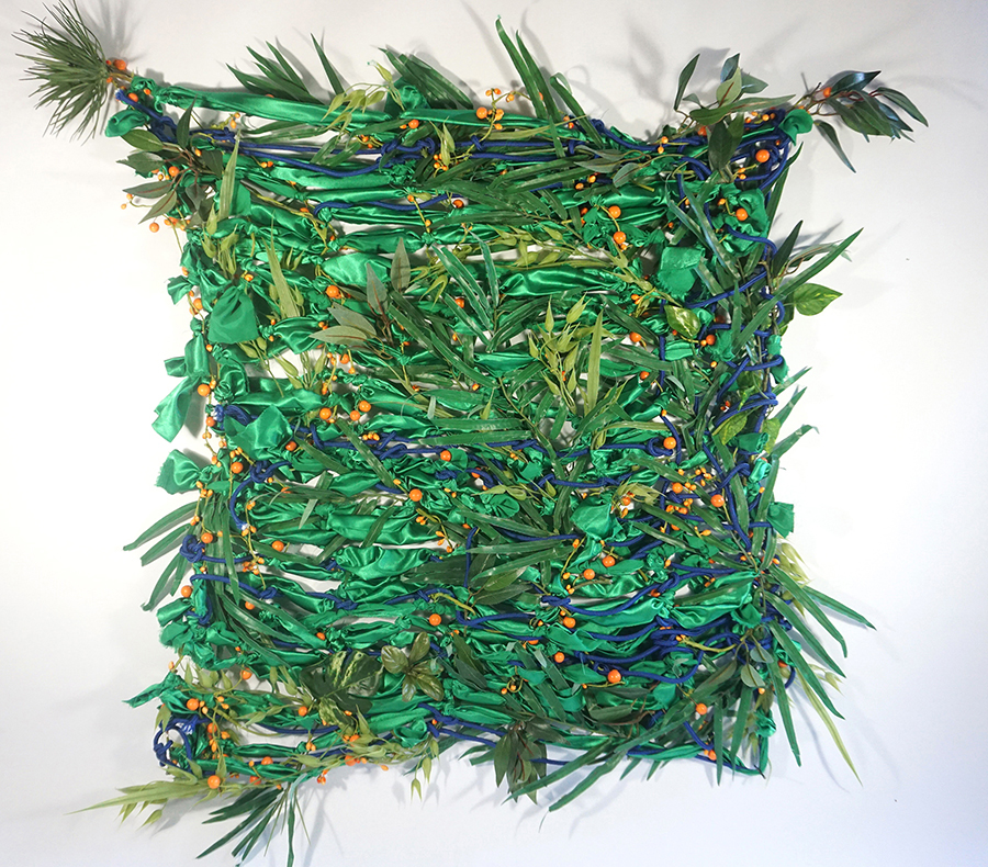 The Woman on the Beach, Tropical Blanket of Warmth, 36x36x3 2018 <br>artificial plants, rope, assorted fabrics